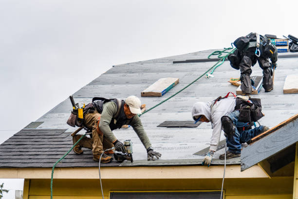 Professional Gutter Installation technician working in Burlington, KS